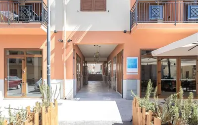 a hallway of a building with potted plants at 1 Bedroom Cozy Apartment In Balestrate in Balestrate