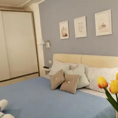 a bedroom with a bed with pillows on it at Quattro Canti Valù in Palermo