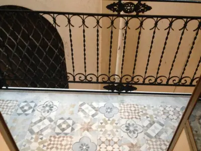 a stairway with a pattern of tiles on it at Quattro Canti Valù in Palermo
