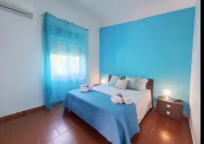 a bathroom with a shower and a toilet and a sink at Holiday Home Green Paradise in Palermo