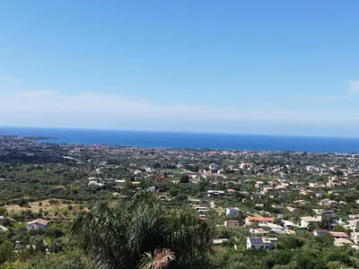 an aerial view of a city with the ocean at Asia Sicilian Home in Carini
