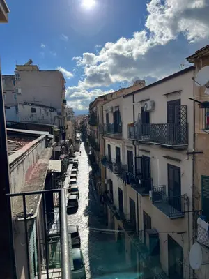 a view of a canal in a city with buildings at Casamori 3- nel cuore del mercato Ballarò in Palermo