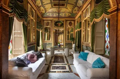 a living room with two white couches and a table at iFlat Suite del Barone with Terrace in Palermo