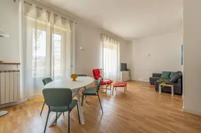 a living room with a couch and a table at Vetro Apartments by Wonderful Italy in Palermo