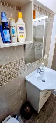 a bathroom with a sink and a mirror at Casa del Vecchio Borgo in Caccamo