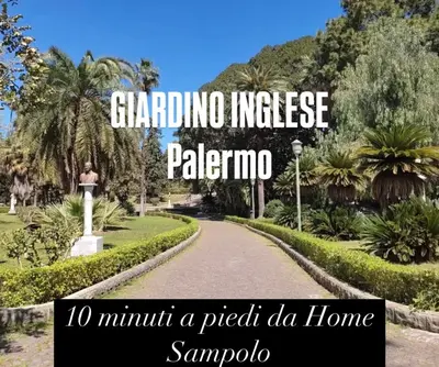 a path in a park with palm trees at Home Sampolo in Palermo