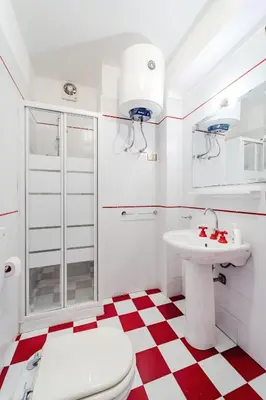 a white bathroom with a toilet and a sink at Pool & Panoramic Villa - 9 mins city center in Palermo