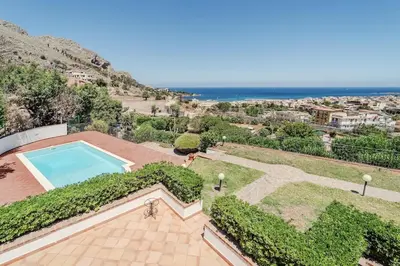 an aerial view of a villa with a swimming pool at Pool & Panoramic Villa - 9 mins city center in Palermo