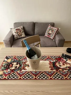 a coffee table with a glass of wine on it at Dimora del Moro in Castellammare del Golfo