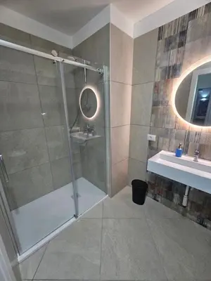 a bathroom with a shower and a sink at Alle Porte di San Vito in San Vito lo Capo