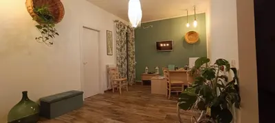 a hotel room with towels on a bed at Green Roof Palermo in Palermo