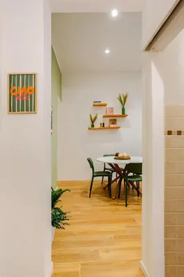 a dining room with a table and chairs at Casa Vacanza Dante 17 Carini in Carini