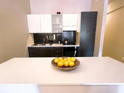 a bowl of fruit on a table in a kitchen at Belmonte 18 in Palermo