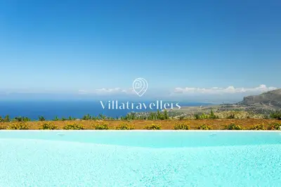 a view of the ocean from a swimming pool at Cava in Scopello