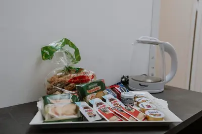 a tray filled with food on a table at House Paradise- House Arena in Porticello
