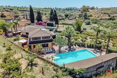 an aerial view of a house with a swimming pool at Huge Villa with Stunnig Pool in Partinico