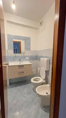 a bathroom with a toilet and a sink at Villafranca33 - Politeama Centro Palermo in Palermo