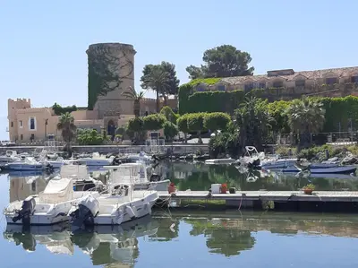 a group of boats are docked in a marina at Da Sandra in Trabia