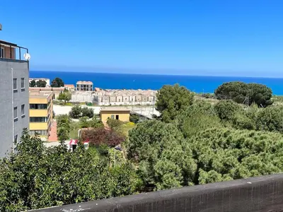 a view of a city and the ocean at Fantastic, sea view apartment via Duchessa in Castellammare del Golfo