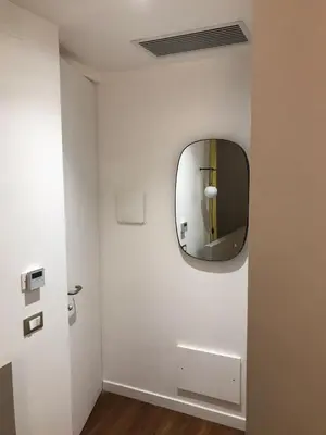 a bathroom with a mirror on the wall at belMORO - La Dimora Del Capo in Palermo