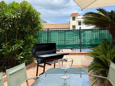a piano sitting on top of a table with a wine glass at Casa Baglio Monti in Palermo
