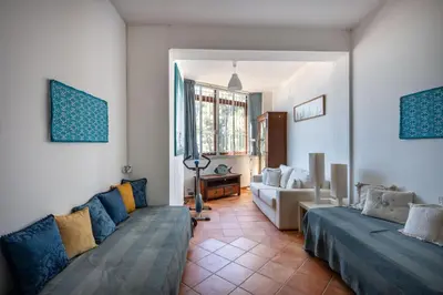 a living room with two couches and a couch at Casa Annibale con Vista Mare by Wonderful Italy in Palermo