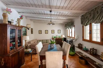 a living room with a table and a couch at Casa Annibale con Vista Mare by Wonderful Italy in Palermo
