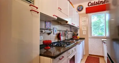 a kitchen with a stove and a counter top at Villa Dream House Scopello in Scopello