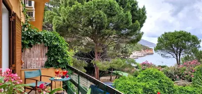 a balcony with a view of the ocean at Villa Dream House Scopello in Scopello