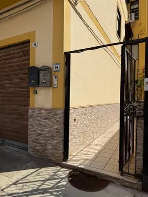an open door to a building with a door at Piccolo Brasile Home in Capaci