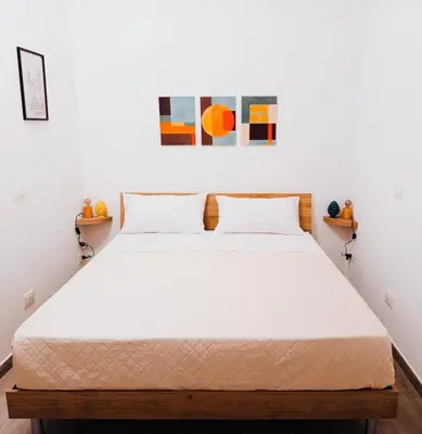 a bedroom with a large bed in a room at Diana ai Quattro Canti - centro storico Palermo in Palermo