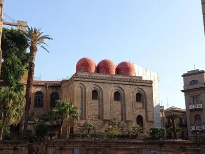 an old building with three domes on top of it at Diana ai Quattro Canti - centro storico Palermo in Palermo