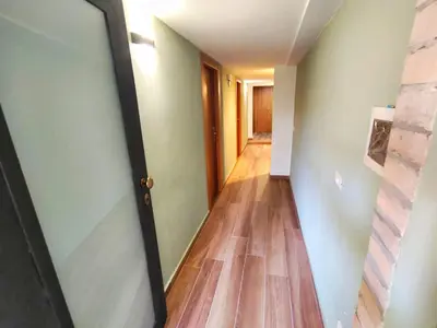 an empty hallway with a mirror in a room at Atypical Rooms in Palermo