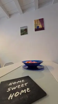 a room with a shelf with plates on it at Apollo Suite in Palermo