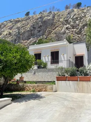 a house on the side of a mountain at Casa Totino Mondello in Palermo