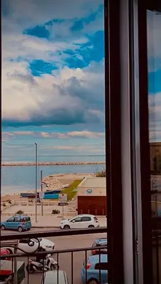 a view from a window of a parking lot at Santerasmo Rooms king in Palermo