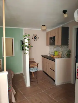 a kitchen with a sink and a counter at Casuzza Nica e Bedda-Centro storico in Palermo