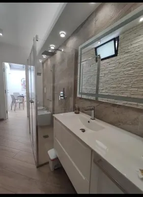 a bathroom with a sink and a mirror at Villa Mare Luna in Balestrate