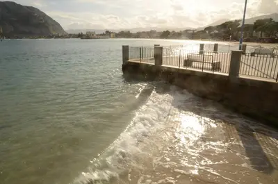 a view of a body of water with a pier at Terrazza 3F Mondello in Palermo