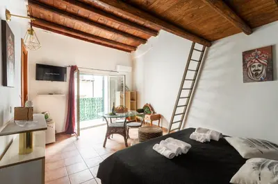 a bathroom with a sink and a toilet and a mirror at Paradise Rooms B&B in Palermo
