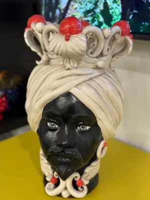 a statue of a woman wearing a headdress at Borbon Home luxury rooms & SPA in Palermo
