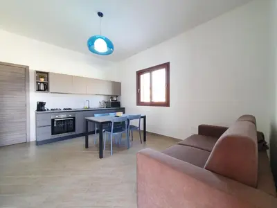 a living room with a couch and a table at Apartment MareLuce by Interhome in Balestrate