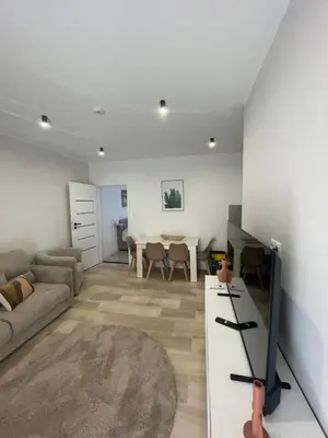 a living room with a couch and a table at Da Andrea in Carini