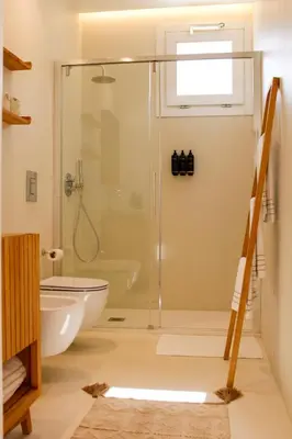 a bathroom with a glass shower and a toilet at Villa Ippolita - Studio with Esclusive Terrace in San Vito lo Capo