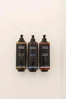 a group of four batteries on a white background at Villa Ippolita - Apartment with Exclusive Garden in San Vito lo Capo