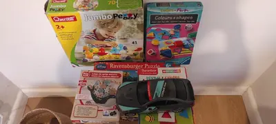 a pile of childrens toys on a shelf at Enjoy Palermo in Palermo