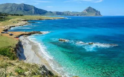 an aerial view of a beach with blue water at Jecko Apartment in San Vito lo Capo