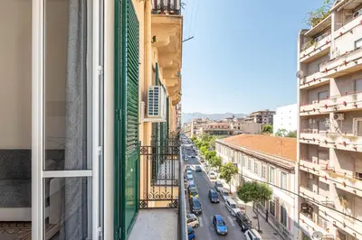 a view of a city street from a window at Casa Florio Love Palermo in Palermo