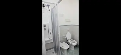 a bathroom with a toilet and a bidet at Casa vucciria in Palermo