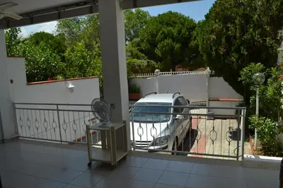 a balcony with a fence and a phone on it at Villa Eugenia - Mondello Beach in Palermo